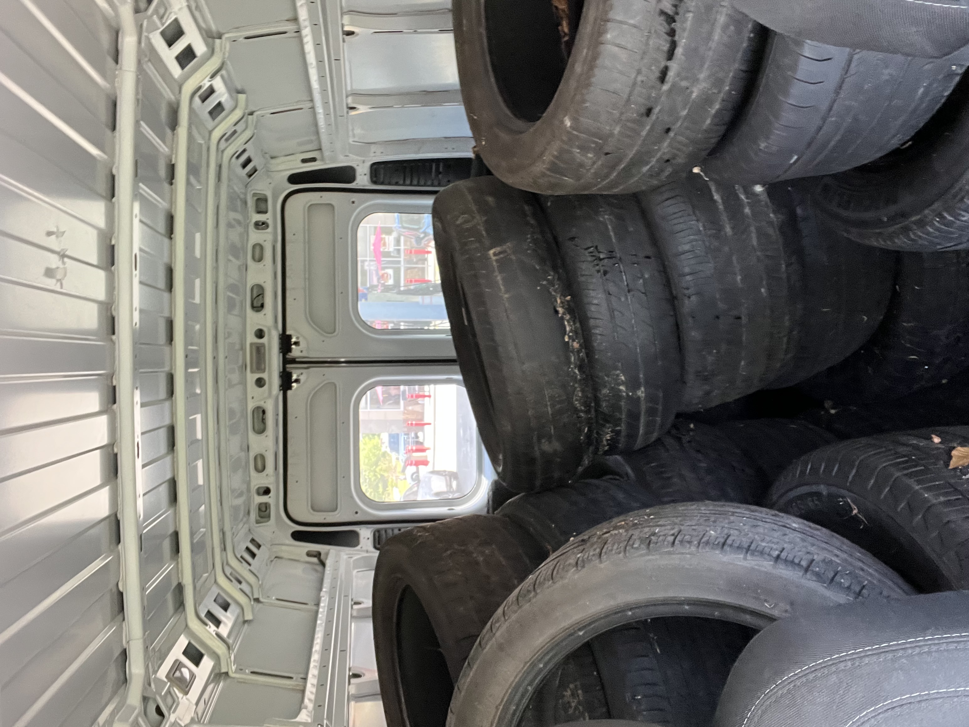 Van loaded with tires
